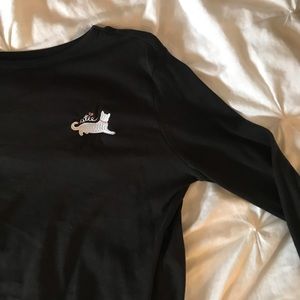 Long sleeve, cropped, and embroidered shirt